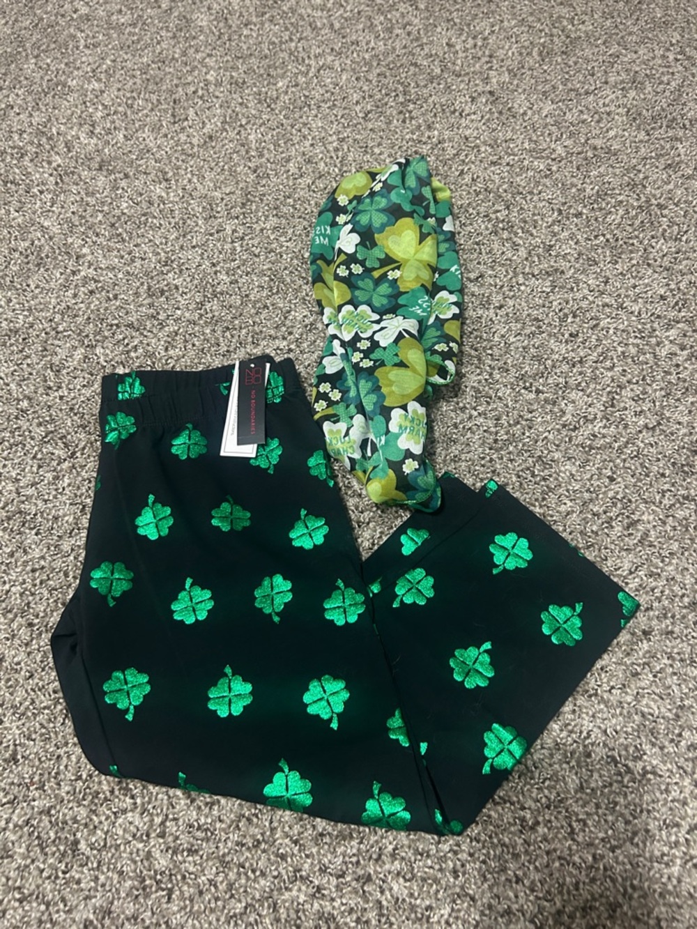 No Boundaries Black Pants with Metallic Green Shamrock Print and scarf.
